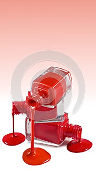 Image of three bottles of red nail polish
