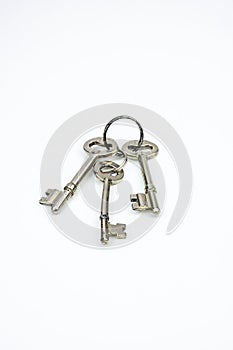 Three Crome door keys