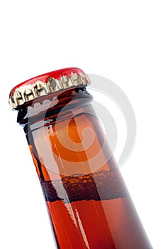 Image of a tilted brown beer bottle neck on white
