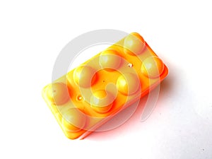 Top view on multi color toy bricks isolated on white  background