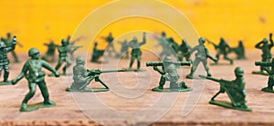 Image of toy soldiers over wooden table