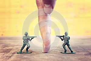 Image of toy soldiers over wooden table