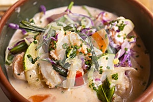 Image of traditional thai dish phanaeng curry with shrimps.