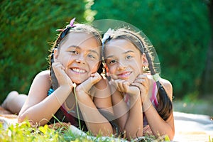 Image of two happy sisters having fun