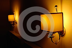 Small wall lamps with warm lighting photo