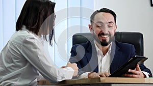 Image of two successful business partners working at meeting in office