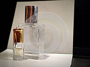 Image of two transparent perfume bottles