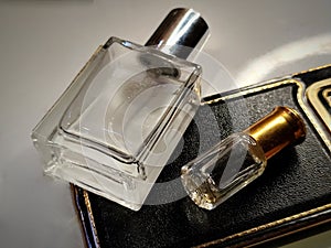 Image of two transparent perfume bottles