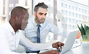 Image of two young businessmen