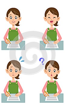 Various facial expressions of housewives filling out documents photo