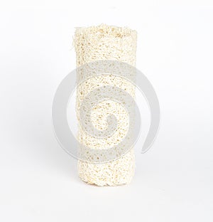 An image vertical isolated close-up one luffa for scrub or shower spa for clean skin background on the white background