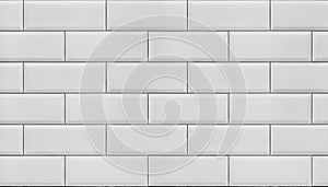 Wall of white tiles.