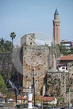 Image of the wall and the minaret yivli minare of the old city