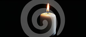 The image of a white candle on a black background is isolated