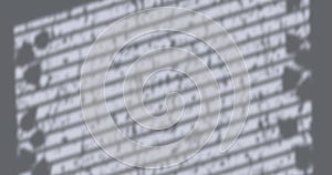 Image of window shadow of leaves blinds and rain falling on grey background