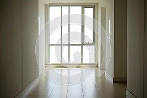 image of windows in modern office building.empty long corridor in the modern office building.