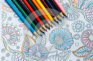 Image of woman coloring, adult coloring book trend, for stress r