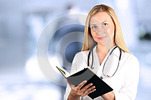 Image of woman doctor looking at camera