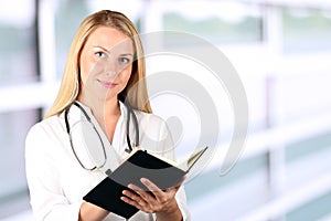 Image of woman doctor looking at camera