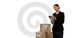 Image of woman holding tablet with stacks of boxes on white background