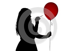 Image woman pierced with a needle balloon