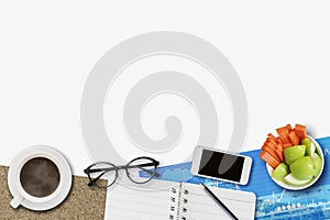 Image of work from home concept show flexible working hour with graph and chart, glasses, book, fruits, mobile phone and coffee on