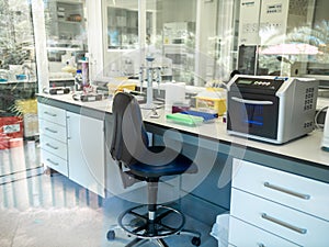 Image of working table in modern medical laboratory with special equipment