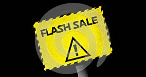 Image of yellow board with flash sale text and alertness sign over black background