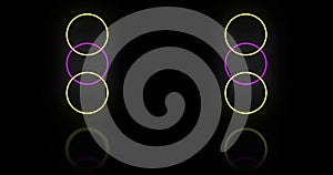 Image of yellow and pink neon circles on black background