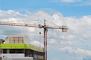 Image of yellow tower cranes construction with blue sky, tower c