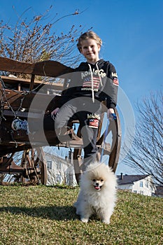 Image of young girl with her dog