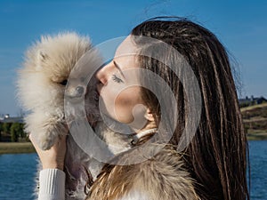 Image of young girl with her dog