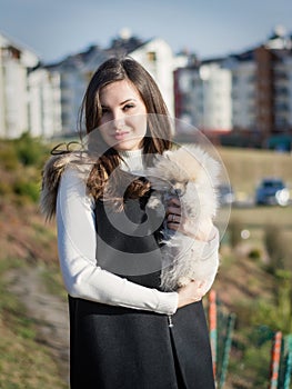 Image of young girl with her dog