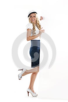 Image of a young sailor girl holding a poster