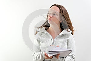 Image of young woman, company worker in glasses, smiling and holding digital tablet, standing over white background