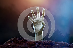 Image of zombie hand sticking out of grave