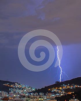 Images of the arrival of a strong summer storm with lightning and rain. Event in the city in the late afternoon, early evening in photo