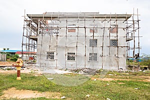 Images of a building in the countryside of Cambodia.