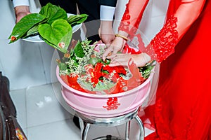 Images of Vietnamese weddings 02: the bride and groom take betel leaf and betel nut