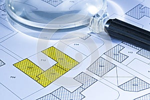 Imaginary cadastral map with buildings, land parcel and vacant p