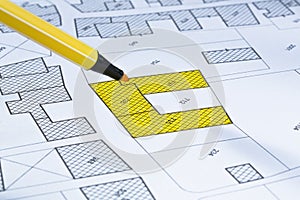 Imaginary cadastral map with buildings, land parcel and vacant plot - land and property registry and real estate property concept