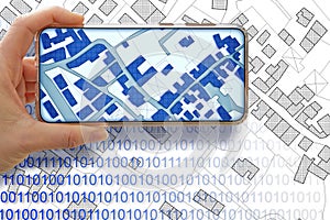 Imaginary cadastral map of territory with buildings and land parcel - concept with smarphone