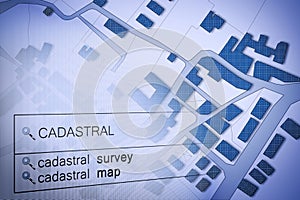 Imaginary cadastral map of territory with buildings and land parcel - land registry concept with text written on a internet