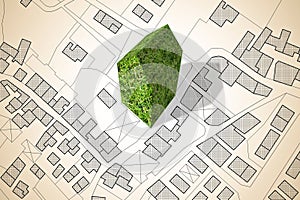 Imaginary city map with a green building - The architecture of the future - concept image