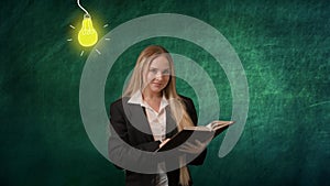 Imagination in problem solving concept. Portrait of woman isolated on green background light bulbs image on top. Girl