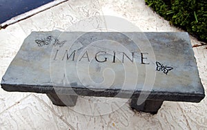 Imagine concrete bench engraving. photo