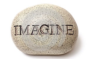 Imagine engraved on a rock. photo