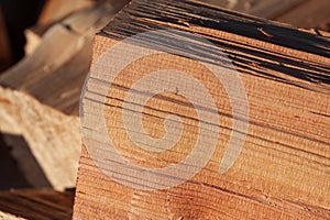 Close-Up of Cedar Firewood â Detailed Wood Grain and Warm Tones