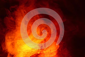 Imitation of bright flashes of orange-red flame. Background of abstract colored smoke