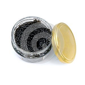 Imitation caviar in a glass jar with a lid. Synthetic food fake fish eggs. White isolated background. Glass jar with imitation